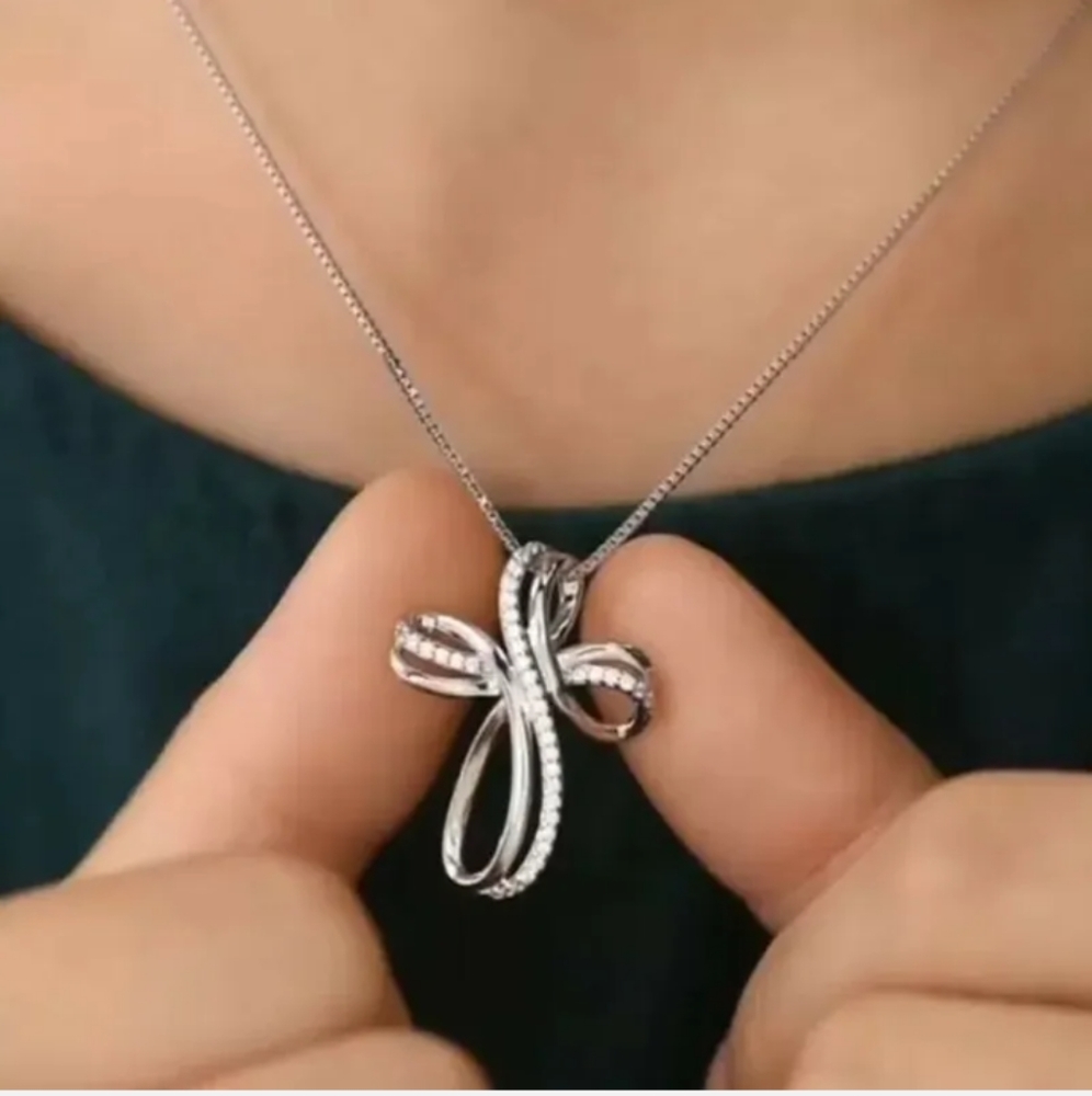New silver twisted cross with cz necklace
